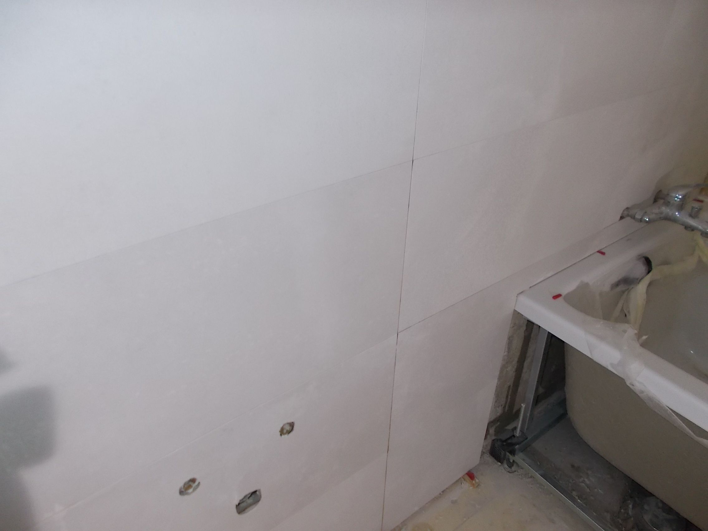 Fotografia de azulejos de casa de banho assentados