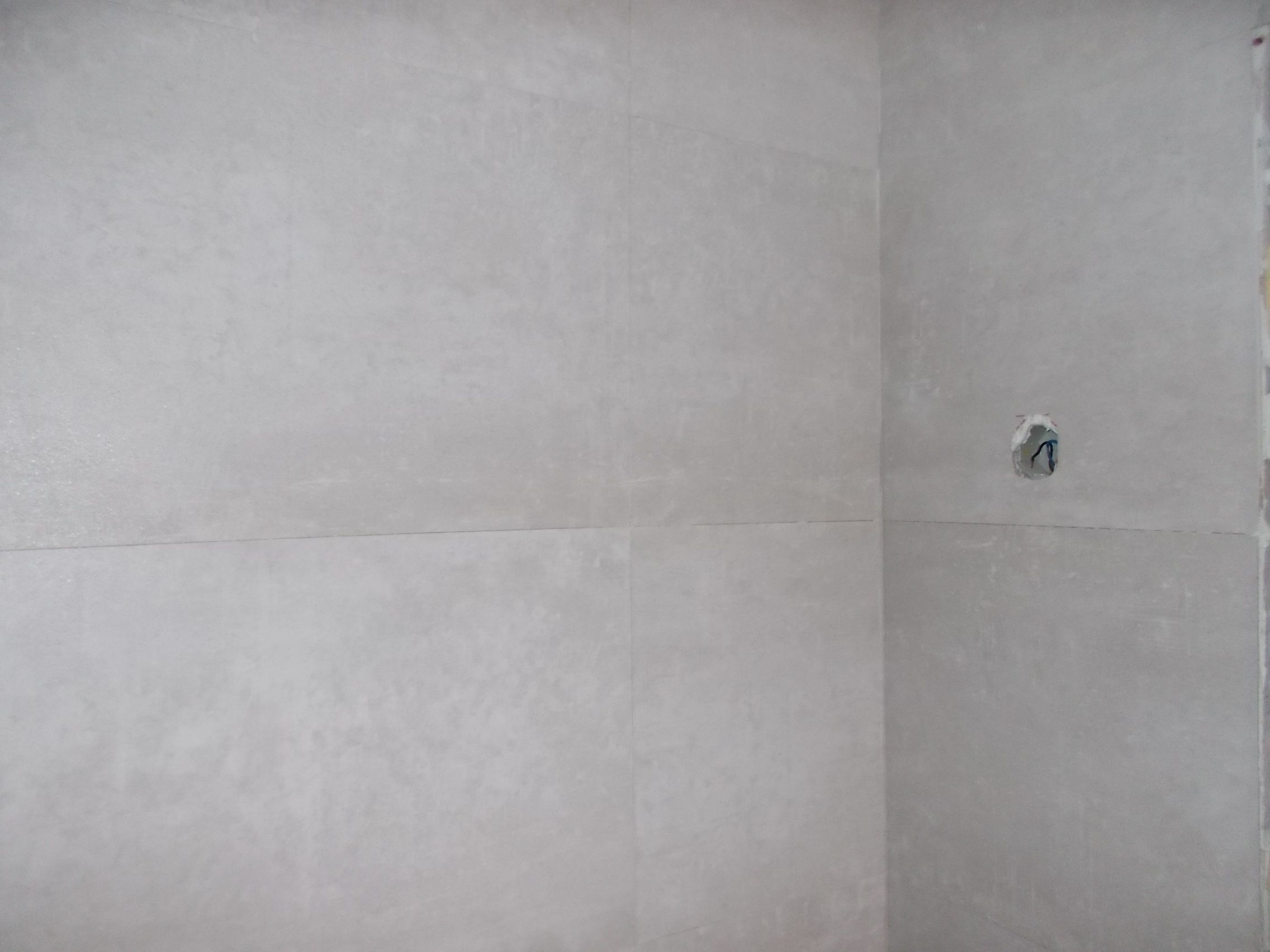 Fotografia de azulejos cinzentos assentados