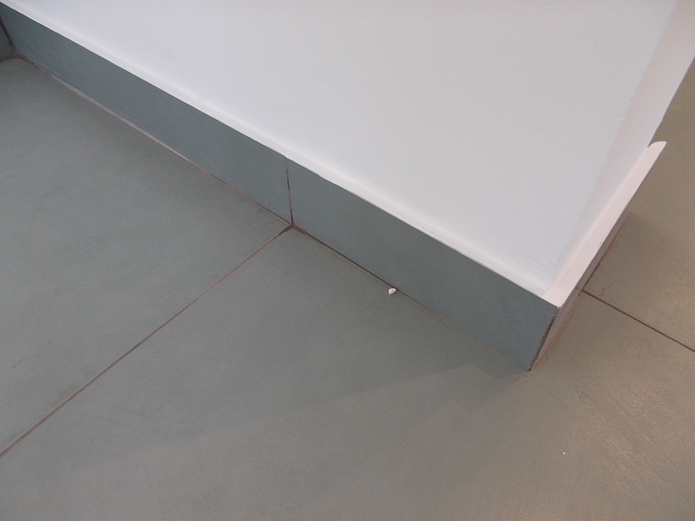 Fotografia de mosaicos e rodap&eacute;